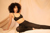 Enticing. Provocative. Riveting  Our Naked Knit leggings are a woven dream. Thick and reliable. As comfortable as they are, wearing them as leisurewear around your home would be a crime. Take your pair of woven delectables out for a spin & watch the world stop for you.  Materials & Care  81% Polyester, 15% Rayon, 4% Spandex Care: Hand wash Made in USA Size & Fit  Model measures: 34B bust, 28” waist, 38.5” hips, 5’8 in height & is wearing a size S. Over-the-heel length
